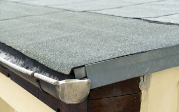 repair or replace Rich Hill flat roofing?